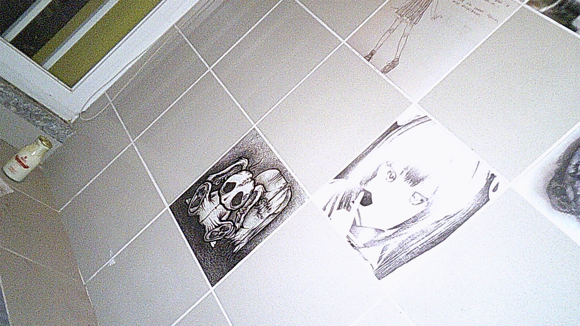 close up of wall tiles, denpa doll and black and white bunny